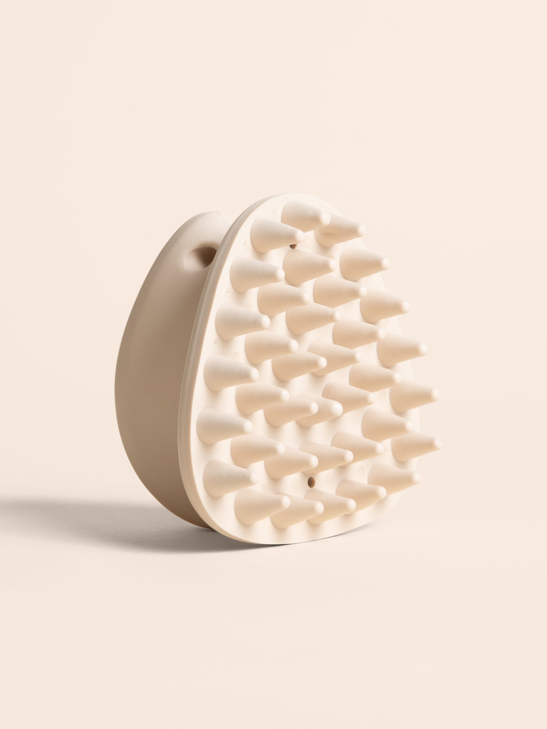 maxbone coat therapy brush, part of the Cleo Society Glow Edit. 